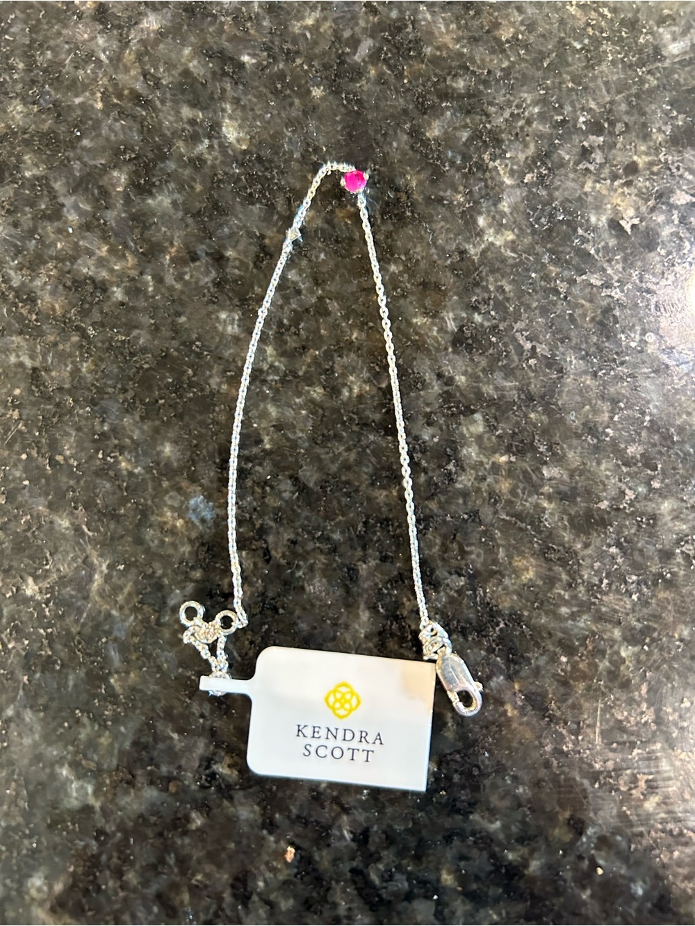 Kendra Scott Silver Ruby bracelet.  71/2 inch length.